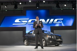 GM's Mark Reuss with 2012 Chevrolet Sonic at 2011 Detroit Auto Show