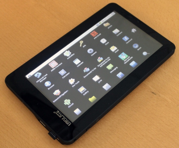 Aakash Android tablet photo, showing startup screen with icons