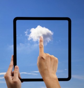 Hand pointing at a cloud in a virtual tablet