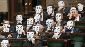 members of parliament in Poland don Guy Fawkes masks to protest ACTA