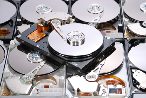 Pile of hard drives with their covers removed