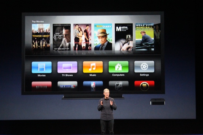 Apple CEO Tim Cook announces the new Apple TV at a press event, March 7, 2012, in San Francisco.