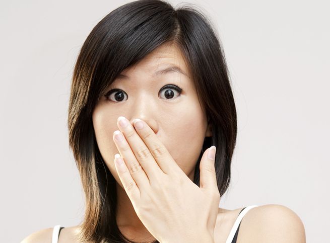 ss-woman-covering-mouth-facebook
