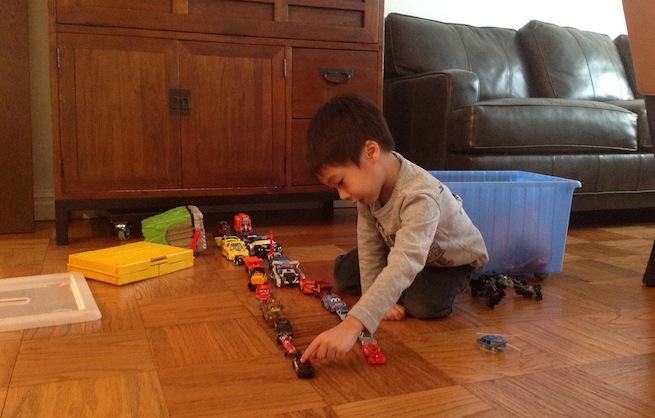 Rocky Agrawal's 4-year-old cousin playing with toy trains