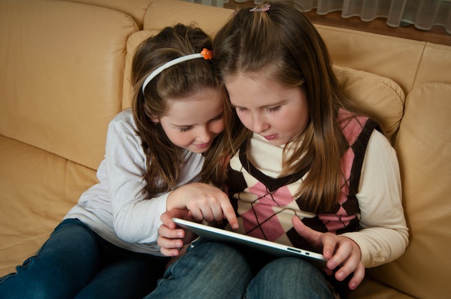 kids playing with tablet