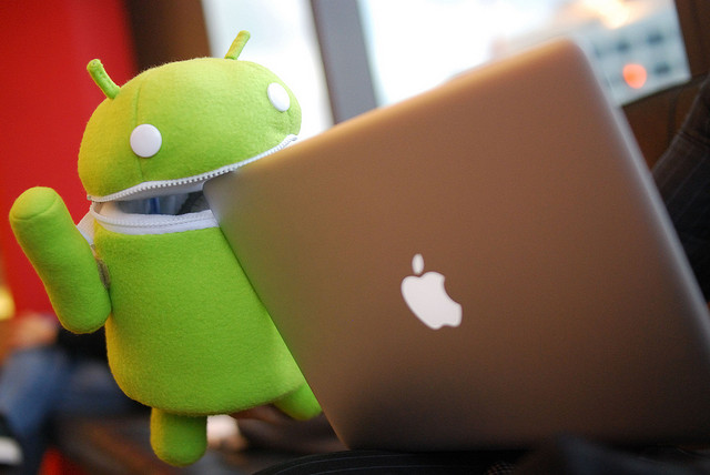 android eating apple macbook