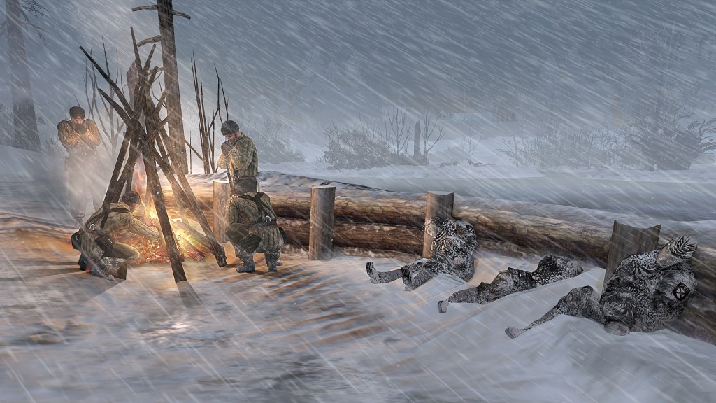 A group of soldiers huddles near a fire, frozen comrades lie nearby.