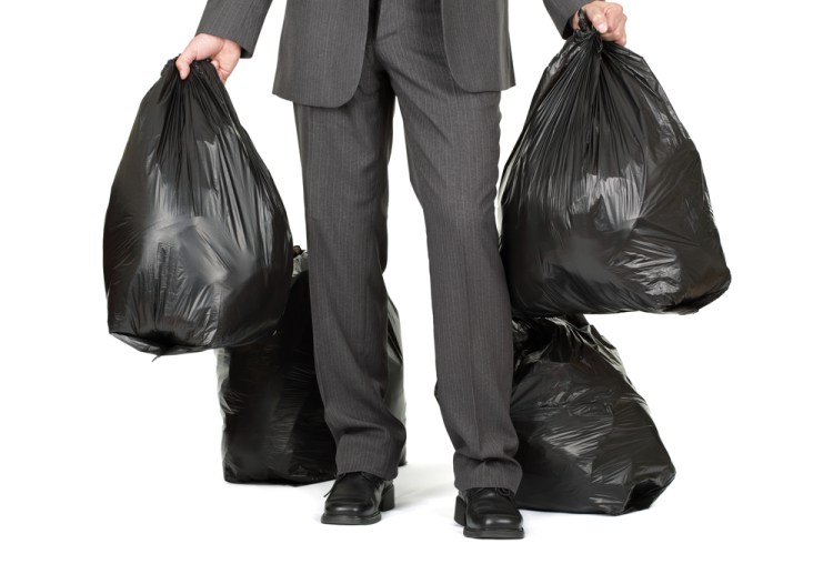 Man with four trashbags