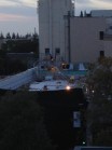 Workers on the roof of what appears to be Apple's new Palo Alto, Calif. store, at 7am on Saturday morning