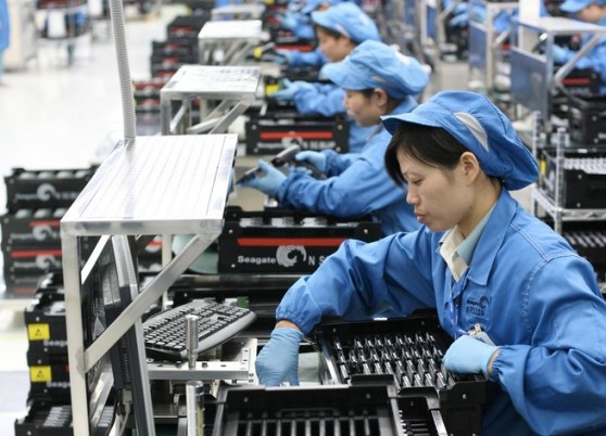 Seagate factory workers assemble 2.5-inch hard drives