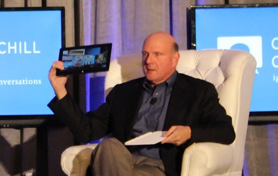 Microsoft CEO Steve Ballmer holds a Surface, running Windows 8, which he says can serve as a digital dashboard