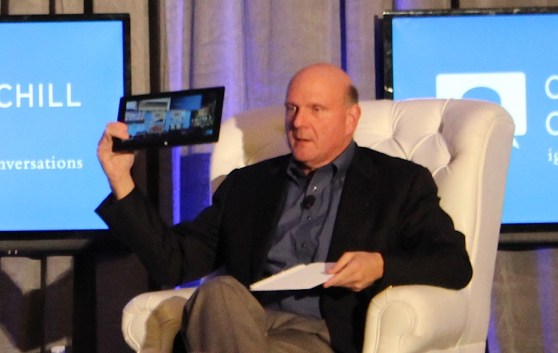 Microsoft CEO Steve Ballmer holds a Surface, running Windows 8, which he says can serve as a digital dashboard