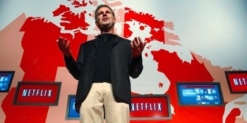 Netflix moves in on HBO’s turf, gets its first cable TV box deal