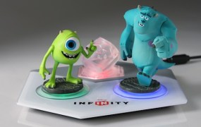 Mike and Sulley with the Disney Infinity base