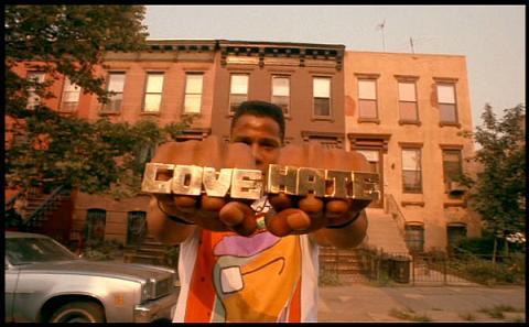 Radio Raheem showing off his LOVE/HATE bling in Do The Right Thing