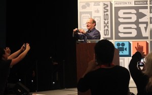 Tim Berners Lee photographs people in the crowd at SXSW 2013