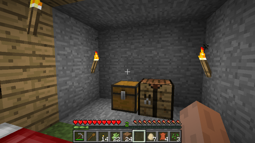 A chest and work bench in Minecraft