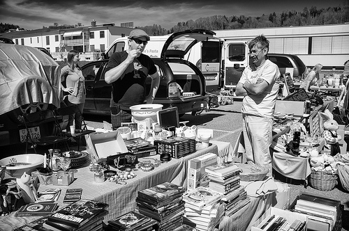 People and stuff at a flea market