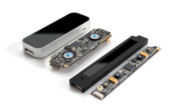 The original Leap, its circuit board, the new embeddable Leap, and its circuit board