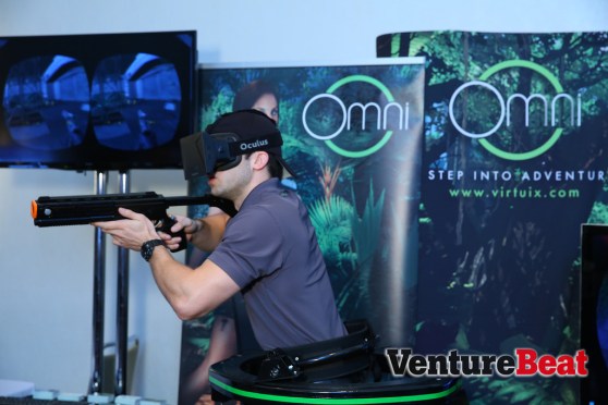 A Virtuix 360-degree treadmill plus an Oculus Rift headset makes for a terrifyingly immersive video game experience at GamesBeat 2013.