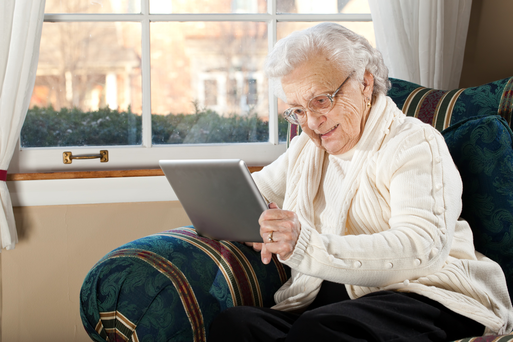 This grandma could make a logo on her tablet with DesignMantic's design tools