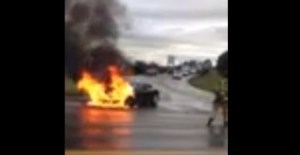 A Tesla Model S in flames, near Kent, Washington.