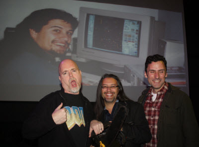 Doom co-creators hold the chainsaw that made it into the game.