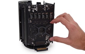 A clamp and four screws secure each of the dual AMD FirePro D300 graphics cards.