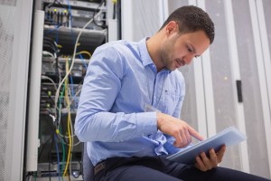 Man tablet servers data center wavebreakmedia shutterstock