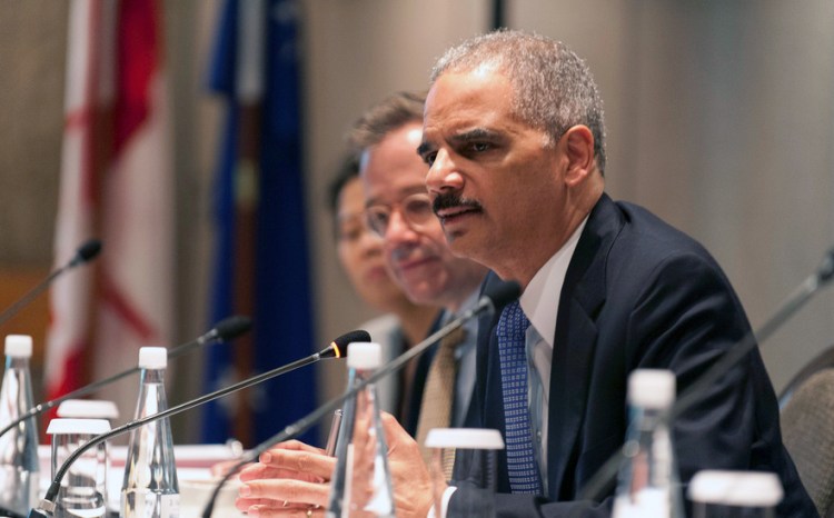 U.S. Attorney General Eric Holder (right)