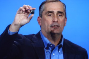 Intel CEO Brian Krzanich showed off the tiny Edison chip for wearables #CES2014