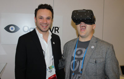 Brendan Iribe and the masked Oculus face of Aaron Davies, head of developer relations.