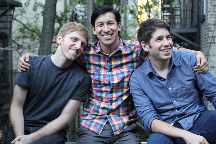 Kickstarter chairman and former CEO, Perry Chen (center), sits with his co-founders Yancey Strickler (right) and Charles Adler (left).