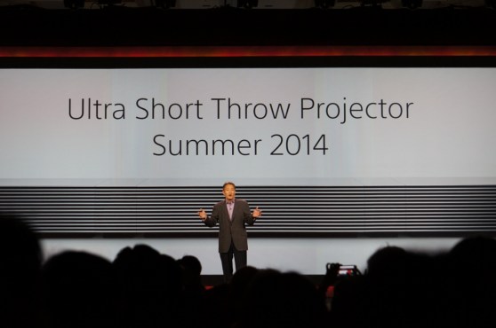 Sony CEO Kaz Hirai in front of its short-range 4K projector