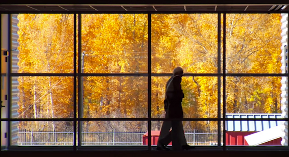 Two silhouettes framed by View's dynamic glass.