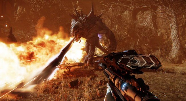 Sniper shoots at a monster in flames in Evolve