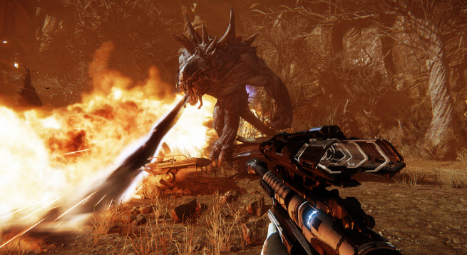 Sniper shoots at a monster in flames in Evolve