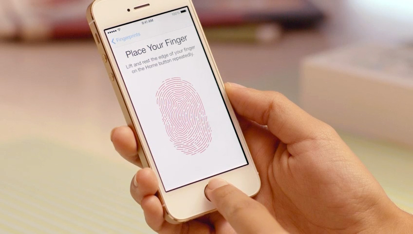 An iPhone 5S owner sets up Touch ID.