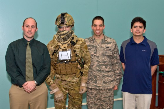 The Air Force's BATMAN team poses with their Google Glass-testing dummy. Left to right: Dr. Gregory Burnett, dummy, 2nd Lieutenant Anthony Eastin, and Andres Calvo.