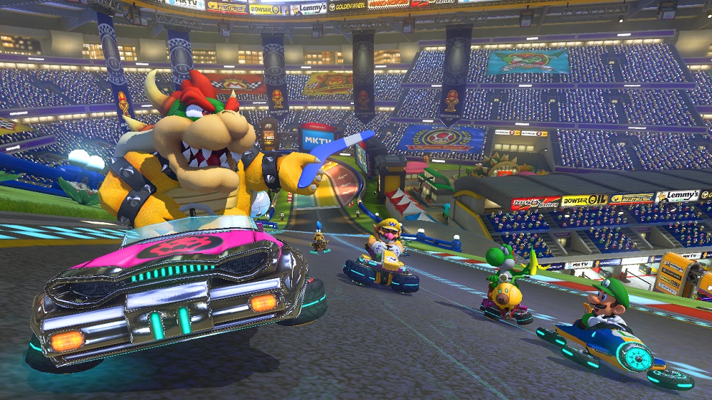 Bowser shows off his blue boomerang, an item new to Mario Kart 8.