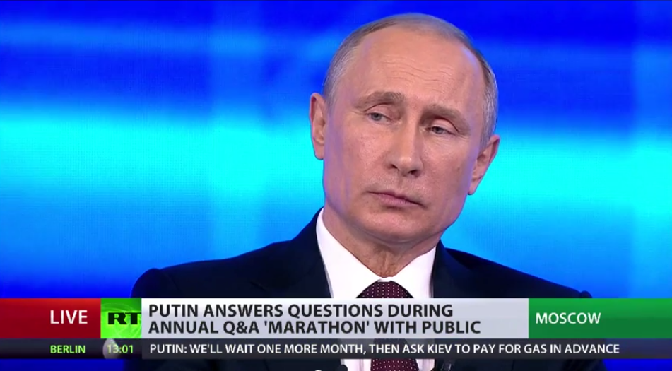 Vladimir Putin, listening yesterday to the translation of Edward Snowden's questions