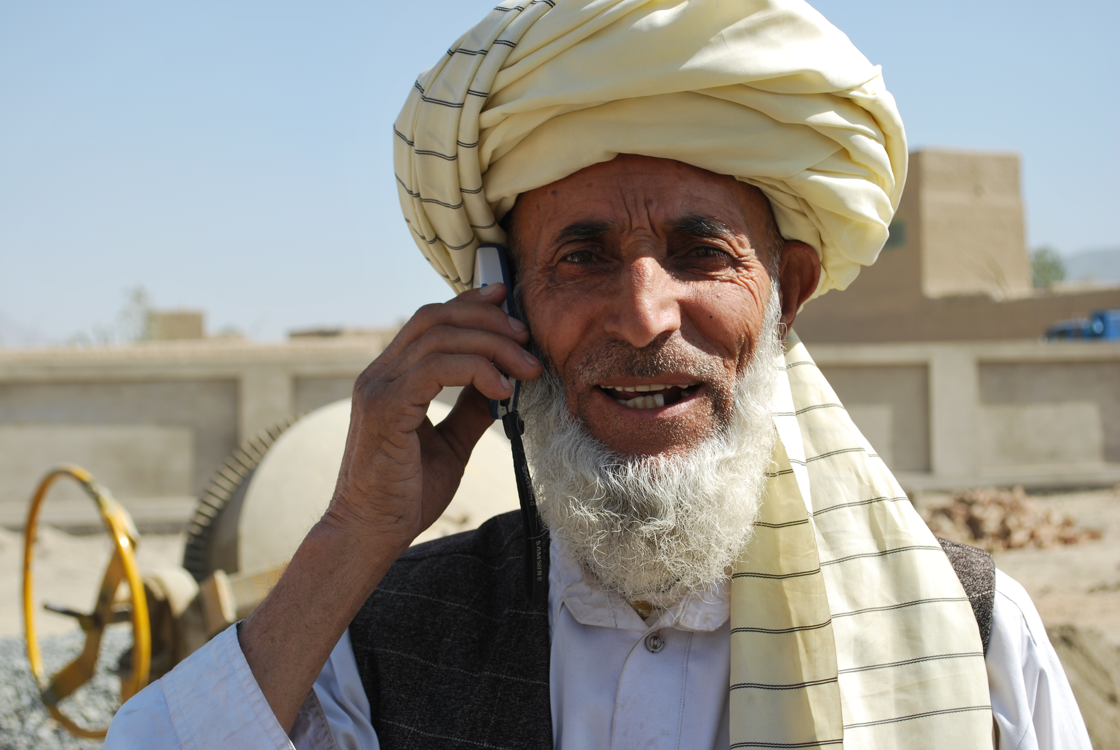 A man on the phone in the Afghani village of Said Ahmad Qazi.