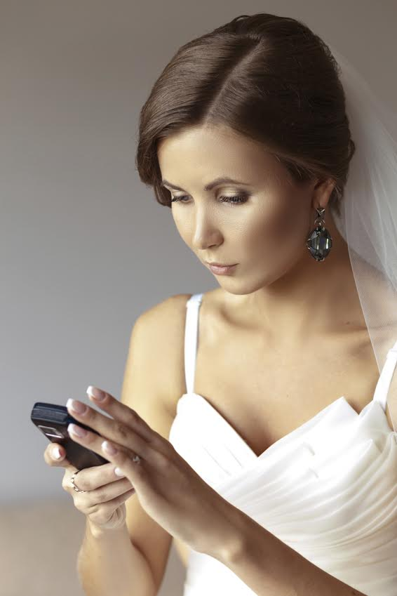 Bride with smartphone