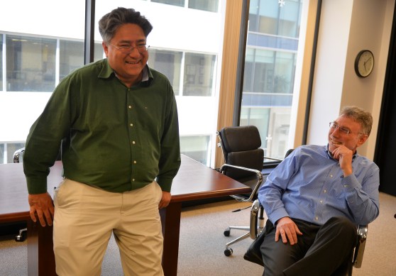 WASHINGTON, DC - MAY 6: Shailesh Prakash, The Washington Post Chief Information Officer, left, and Marty Baron, Washington Post Executive Editor, hold a conversation at The Washington Post on May 6, 2014 in Washington, D.C. (Photo by Ricky Carioti/The Washington Post)