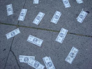 Fake notes glued to the sidewalk promoting Mafia Wars.