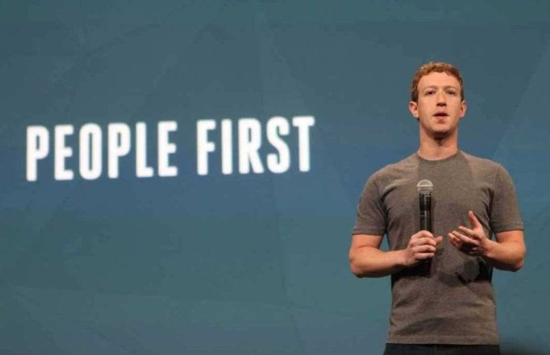 "People first," the slide behind Facebook founder Mark Zuckerberg proclaims.