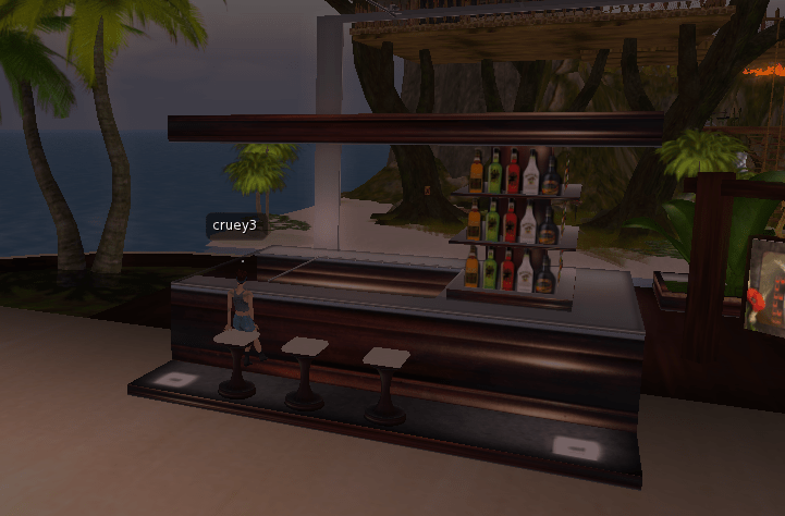 we-soon-got-tired-of-watching-me-make-boxes-and-made-our-way-to-the-third-location-where-judy-likes-to-hang-out-in-second-life-the-clubs-i-took-a-load-off-at-a-nearby-bar