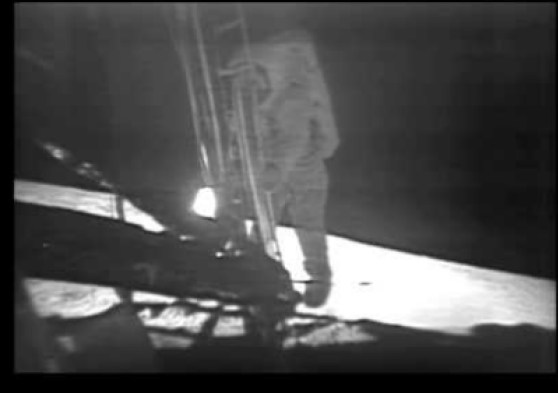 Suspected light source just to the left of the ladder by Aldrin’s hand.