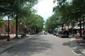 It took shop owners on the north (right) side of Hay Street in Fayetteville, North Carolina years to convince Time Warner Cable to provide them with Internet service, even though the south side of the street was wired. 