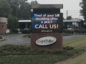 The Tullahoma Utilities Board touts the advantages of its gigabit LighTUBe broadband network on a sign outside its offices.